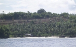 Von Palmen umzäunter Stran auf Bali
